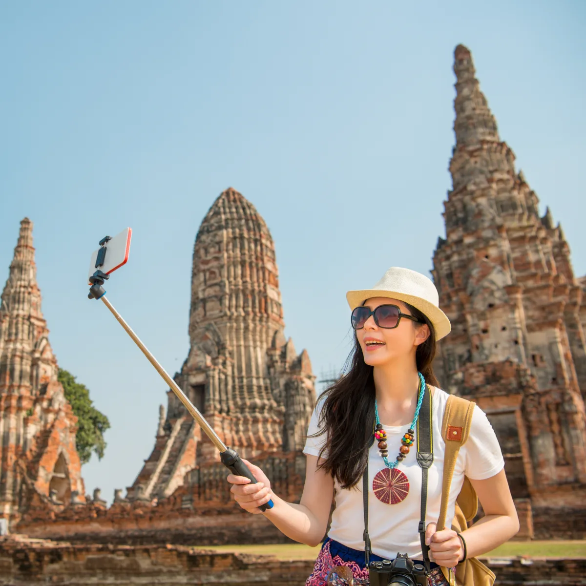 A traveler exploring an ancient temple in Ayutthaya