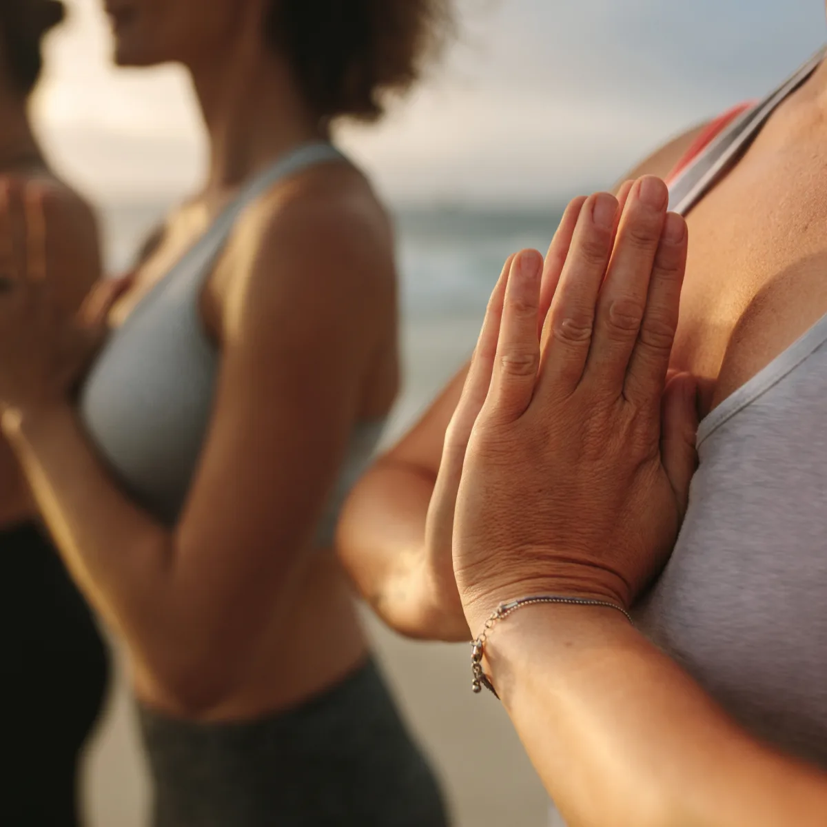 Guests enjoying gentle yoga by the sea